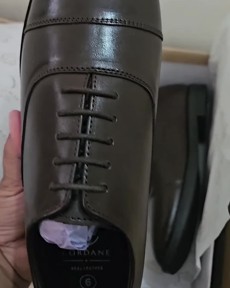 Dark brown cap-toe oxford, top view