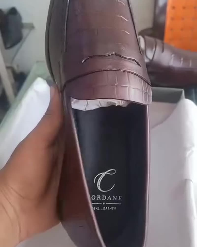 Wine croc-embossed penny loafer