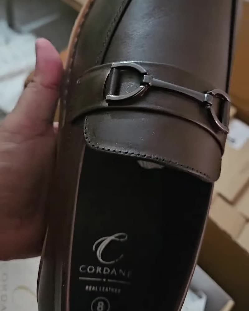 Brown leather horsebit loafer with gum sole